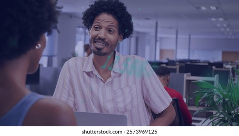 Image of financial data processing over diverse colleagues discussing work in office. Global business, finances, computing and digital interface concept digitally generated image.