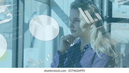Image of financial data processing over caucasian businesswoman in office. Global finance, business, connections, computing and data processing concept digitally generated image.