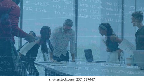 Image of financial data processing over diverse business people in office. Global finance, business, connections, computing and data processing concept digitally generated image.