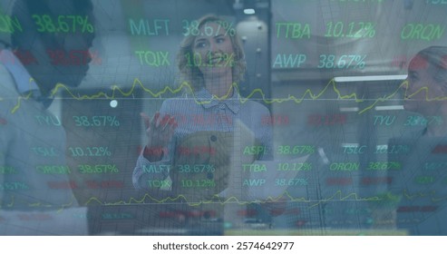 Image of financial data processing over diverse business people in office. Global finance, business, connections, computing and data processing concept digitally generated image.