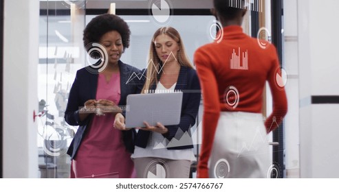Image of financial data processing over diverse business people in office. Global finance, business, connections, computing and data processing concept digitally generated image.