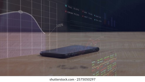 Image of financial data processing over smartphone on table. Global business, finances, computing, communication and digital interface concept digitally generated image.