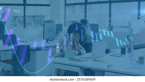 Image of financial data processing over diverse business people in office. Global finance, business, connections, computing and data processing concept digitally generated image.