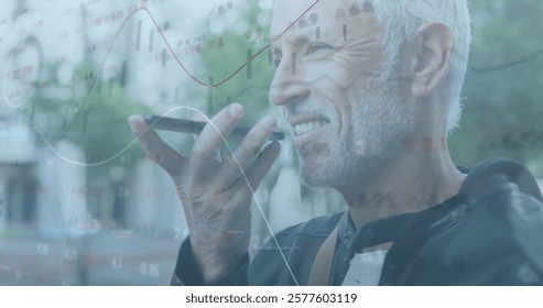 Image of financial data processing over caucasian man using smartphone. Global finance, business, connections, computing and data processing concept digitally generated image