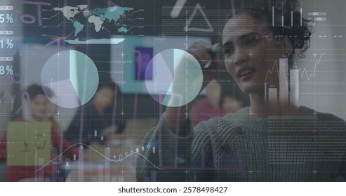 Image of financial data processing over diverse business people in office. Global finance, business, connections, computing and data processing concept digitally generated image.