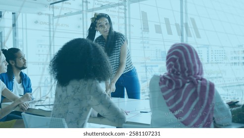 Image of financial data processing over diverse business people in office. Global finance, business, connections, computing and data processing concept digitally generated image.