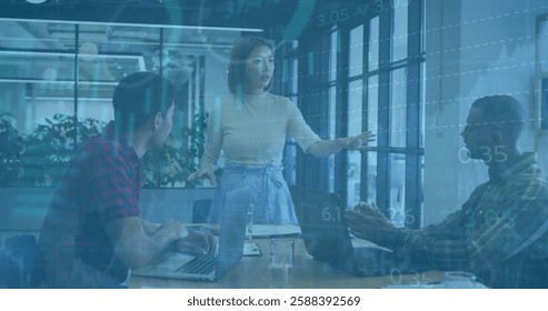 Image of financial data processing over diverse business people in office. Global finance, business, connections, computing and data processing concept digitally generated image. - Powered by Shutterstock - Get 15% off with code: PIKWIZARD15