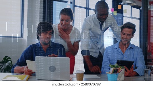 Image of financial data processing over diverse colleagues discussing work in office. Global business, finances, computing and digital interface concept digitally generated image.
