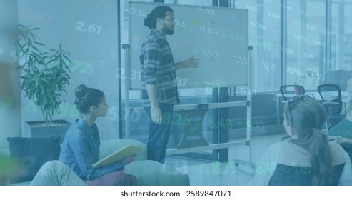 Image of financial data processing over diverse business people in office. Global finance, business, connections, computing and data processing concept digitally generated image.