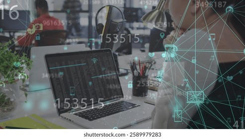 Image of financial data processing over caucasian businesswoman using laptop. Global business, finances, computing and data processing concept digitally generated image.