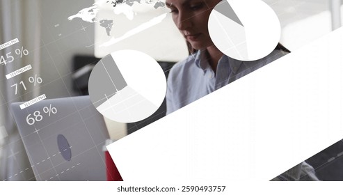 Image of financial data processing over caucasian businesswoman using laptop in office. Global business, finances, computing and digital interface concept digitally generated image.