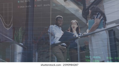Image of financial data processing over diverse business people in office. Global finance, business, connections, computing and data processing concept digitally generated image.