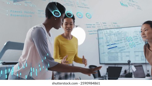 Image of financial data processing over diverse business people in office. Global finance, business, connections, computing and data processing concept digitally generated image.