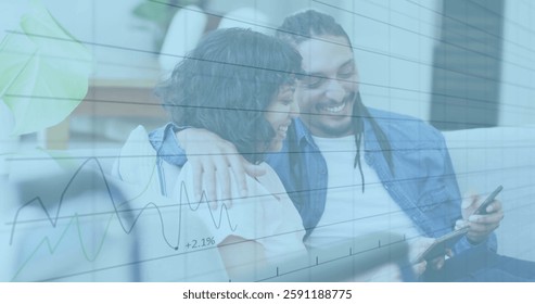 Image of financial data processing over biracial couple using smartphone. Global business, finances, computing and digital interface concept digitally generated image.