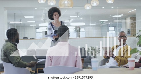 Image of financial data processing over diverse business people in office. Global finance, business, connections, computing and data processing concept digitally generated image.