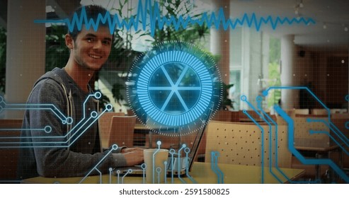 Image of financial data processing over caucasian businessman using laptop. Global finance, business, connections, computing and data processing concept digitally generated image.