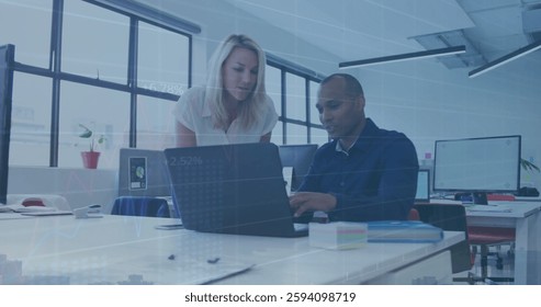 Image of financial data processing over diverse colleagues using laptop in office. Global business, finances and digital interface concept digitally generated image.