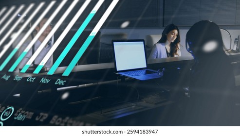 Image of financial data processing over diverse colleagues working in office. Global business, finances, computing and digital interface concept digitally generated image. - Powered by Shutterstock - Get 15% off with code: PIKWIZARD15