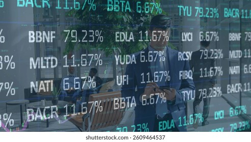 Image of financial data processing over businessman. global business, finances and data processing concept digitally generated image.