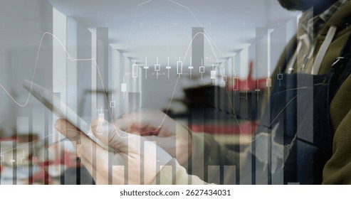 Image of financial data processing over caucasian businessman using smartphone. Global business finance data processing and technology concept digitally generated image.