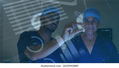 Image of financial data processing over two diverse doctors. Global medicine, technology, data processing and digital interface concept digitally generated image.