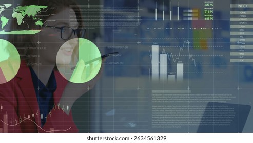 Image of financial data processing over businesswomen using smartphone. Global business, finances, data processing and digital interface concept digitally generated image.