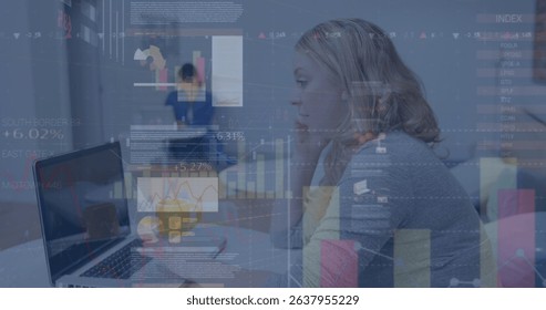Image of financial data processing over caucasian women using laptop. Global connections, data processing and digital interface concept digitally generated image.