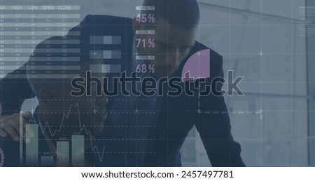 Image of financial data processing over two diverse business people. global business, finances, data processing and digital interface concept digitally generated image.