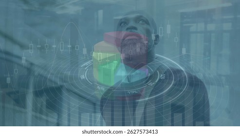 Image of financial data processing and scope scanning over african american businessman. Global business, finance and data processing concept digitally generated image.