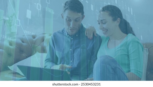 Image of financial data processing and statistics over caucasian couple. Global business, finance and data processing concept digitally generated image.