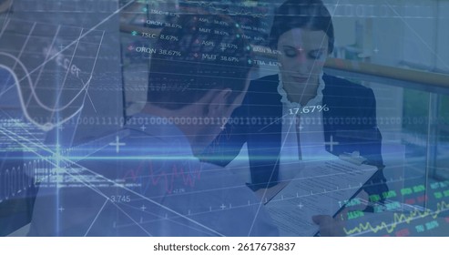 Image of financial data processing and stock market over diverse business people. global business, finances and digital interface concept digitally generated image.