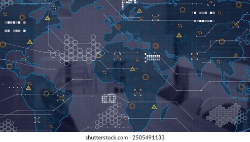 Image of financial data processing and world map over desk in office. Global finance, business, connections, computing and data processing concept digitally generated image.