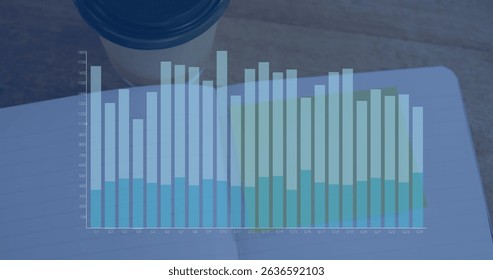 Image of financial graph over notebook on desk. Global business, connections, data processing and digital interface concept digitally generated image.