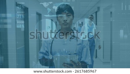 Image of financial graphs and data over happy asian female doctor. health, medical profession, economy, finance and technology concept digitally generated image.