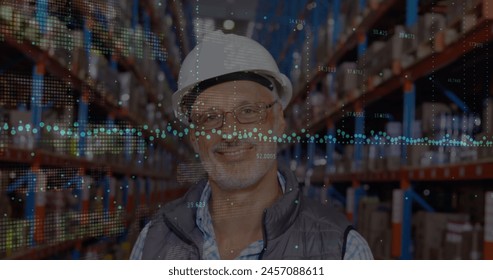 Image of financial graphs over happy senior caucasian male warehouse worker. business, finance and delivery services concept digitally generated image. - Powered by Shutterstock