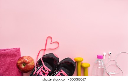 Image Of Fitness Equipment On Pink  Background