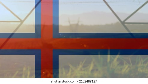 Image of flag of faroe islands over pylons. ukraine crisis and international politics concept digitally generated image. - Powered by Shutterstock