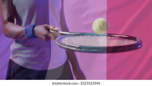 Image of flag of france over african american female tennis player with tennis ball and racket. Sports, competition and active lifestyle concept digitally generated image. - Powered by Shutterstock