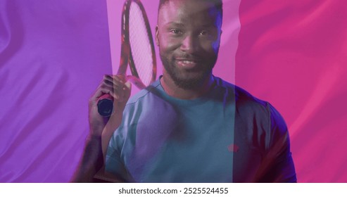 Image of flag of france over african american male tennis player. Sports, competition and active lifestyle concept digitally generated image. - Powered by Shutterstock