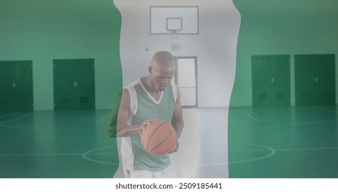 Image of flag of nigeria over african american basketball player on court. Global sports, competition, connections, computing and data processing concept digitally generated image. - Powered by Shutterstock