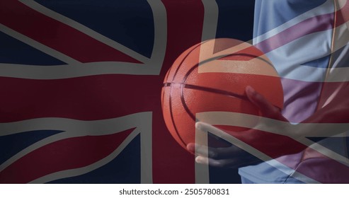 Image of flag of uk over biracial male basketball holding ball. Sport, flags and digital interface concept digitally generated image. - Powered by Shutterstock