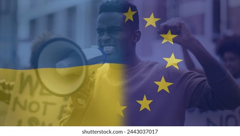 Image of flag of ukraine and european union over african american male protester. ukraine crisis and international politics concept digitally generated image. - Powered by Shutterstock