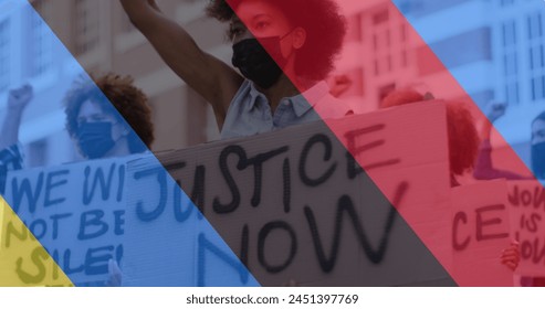 Image of flag of ukraine and russia over diverse protesters in face masks. ukraine crisis and international politics concept digitally generated image. - Powered by Shutterstock