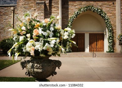 An Image Of Flower With The Church Doors Before A Wedding