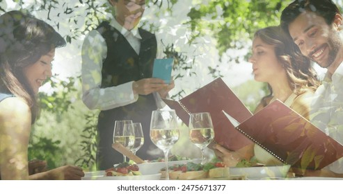 Image of foliage over caucasian friends and waitress ordering wine at restaurant. wine business, celebration and spending time together concept digitally generated image. - Powered by Shutterstock