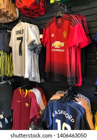 Image Of Football Shirts At A Football Shop - Manchester United, Juventus And Roma.