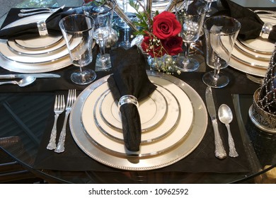 An Image Of A Formal Dining Room Place Setting