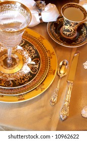 An Image Of A Formal Dining Room Place Setting