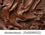 Image of Fresh made chocolate frosting for cake close up. Professional photo for food blog