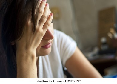 An image of girl with headache